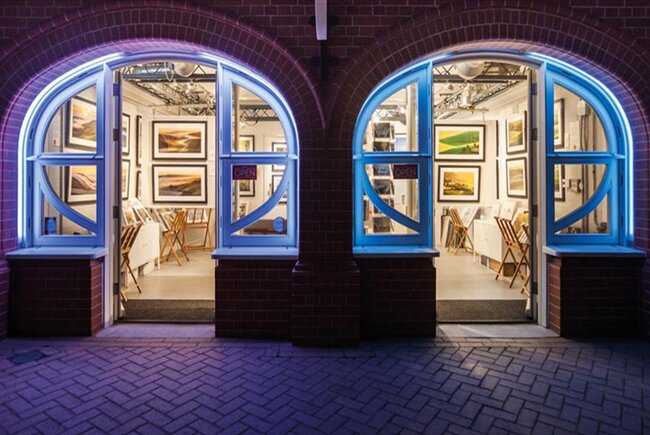 Brighton Photography lit up on Brighton seafront